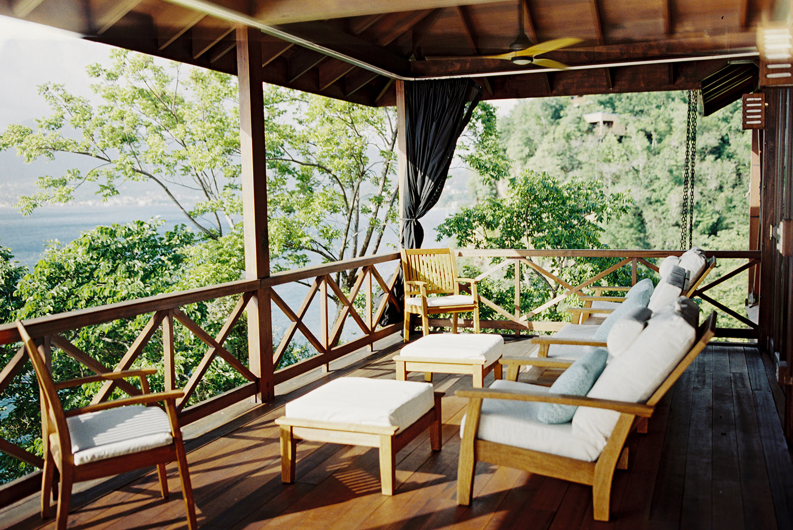 Lounge seating on a private terrace at Secret Bay, Portsmouth, Dominica
