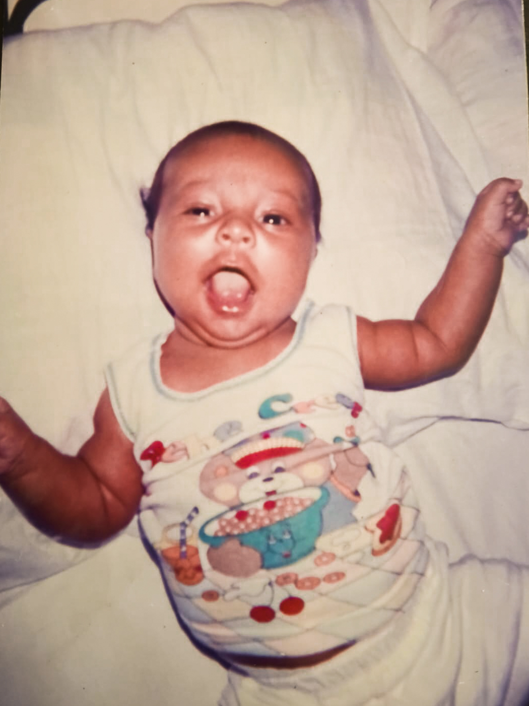 Nicolás as a baby, Asia's first son