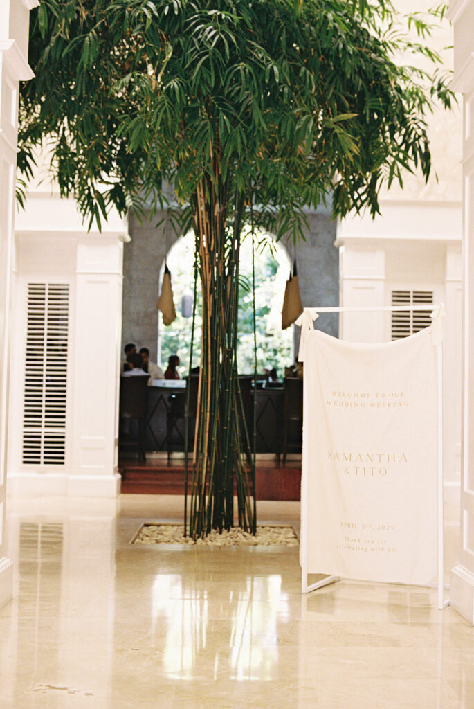 The white arches and tree-filled lobby of Casa Colonial, Puerto Plata, Dominican Republic