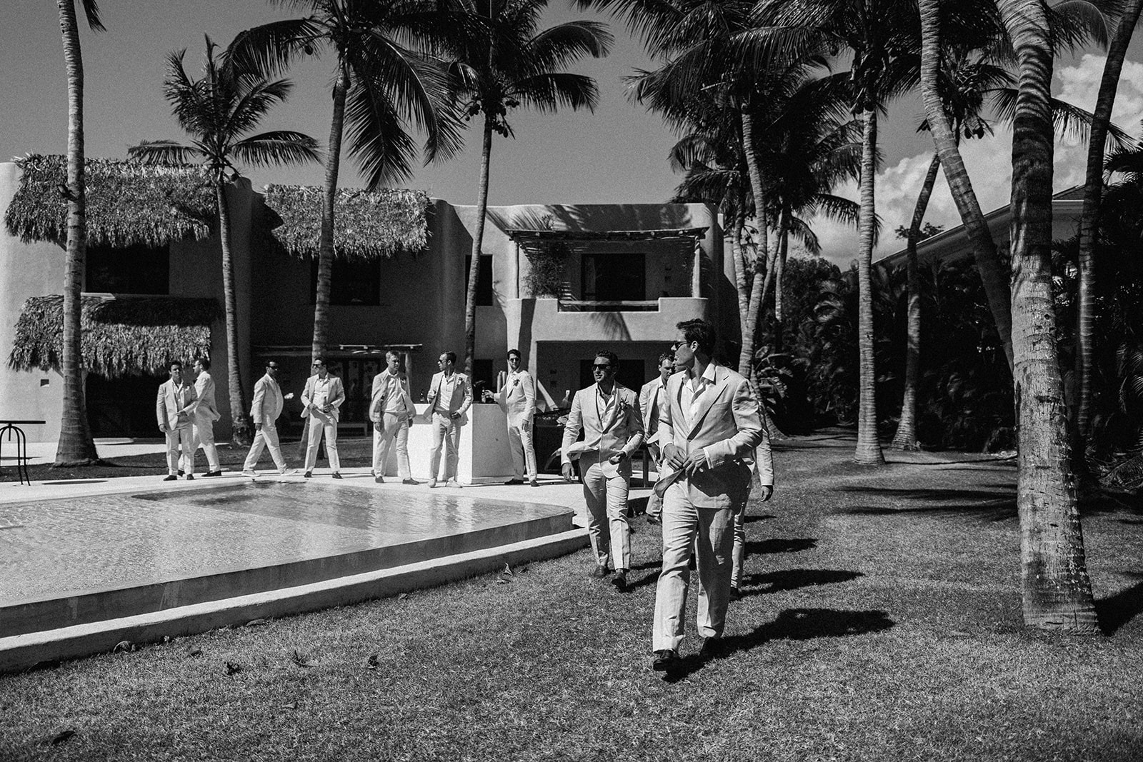 Groom walking to ceremony black and white, Lauren & August's Casa de Campo wedding, Dominican Republic