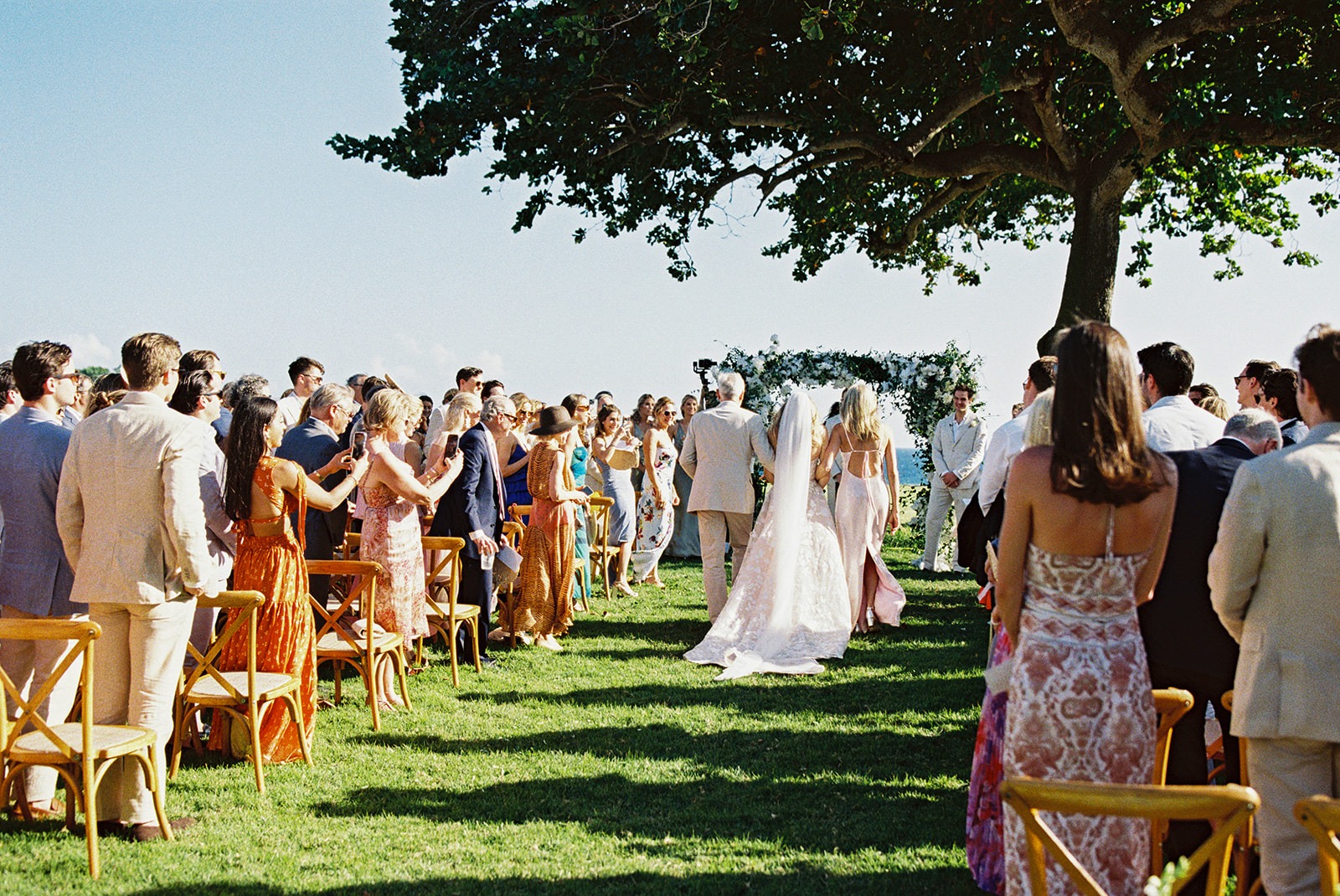 Bride aisle entrance oceanfront ceremony, Lauren & August's Casa de Campo wedding, Dominican Republic