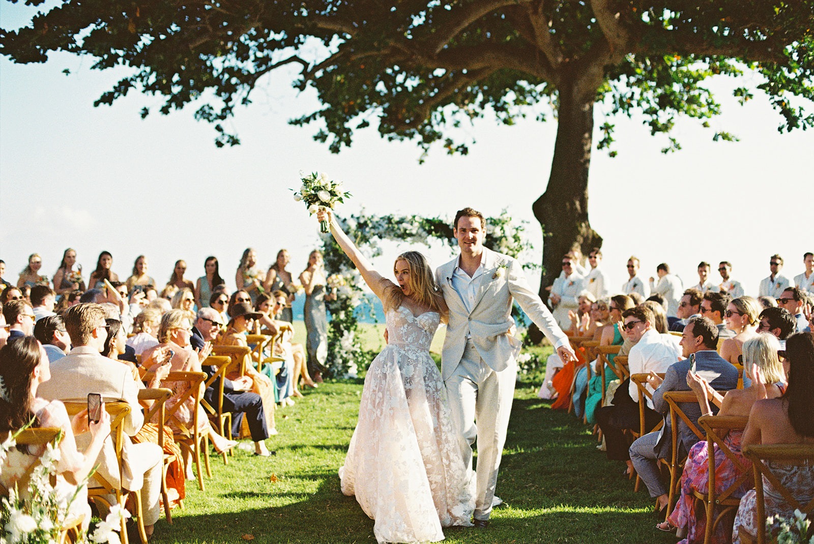 Newlyweds walking down aisle 2, Lauren & August's Casa de Campo wedding, Dominican Republic