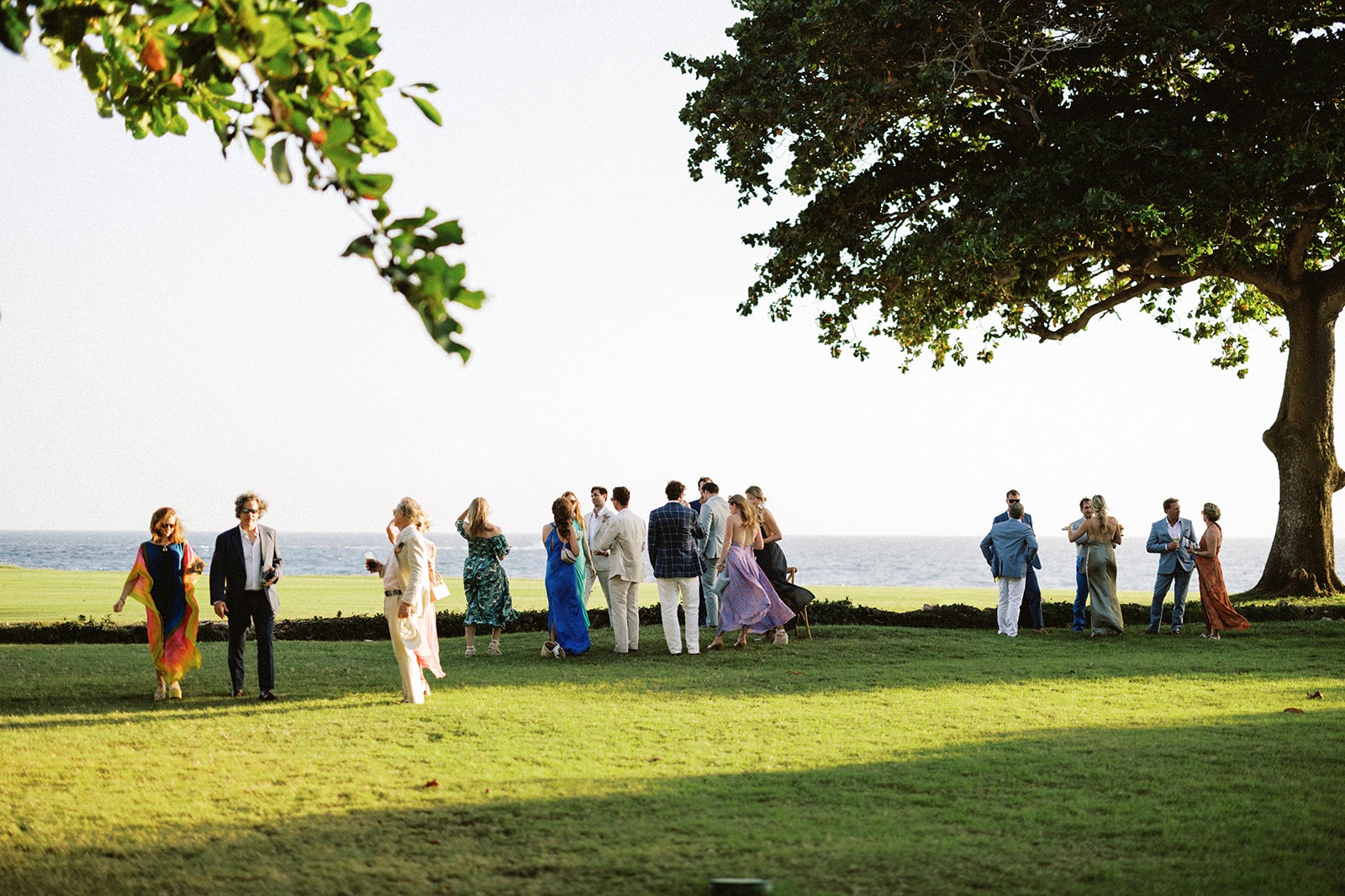 Guests cocktail hour oceanfront, Lauren & August's Casa de Campo wedding, Dominican Republic