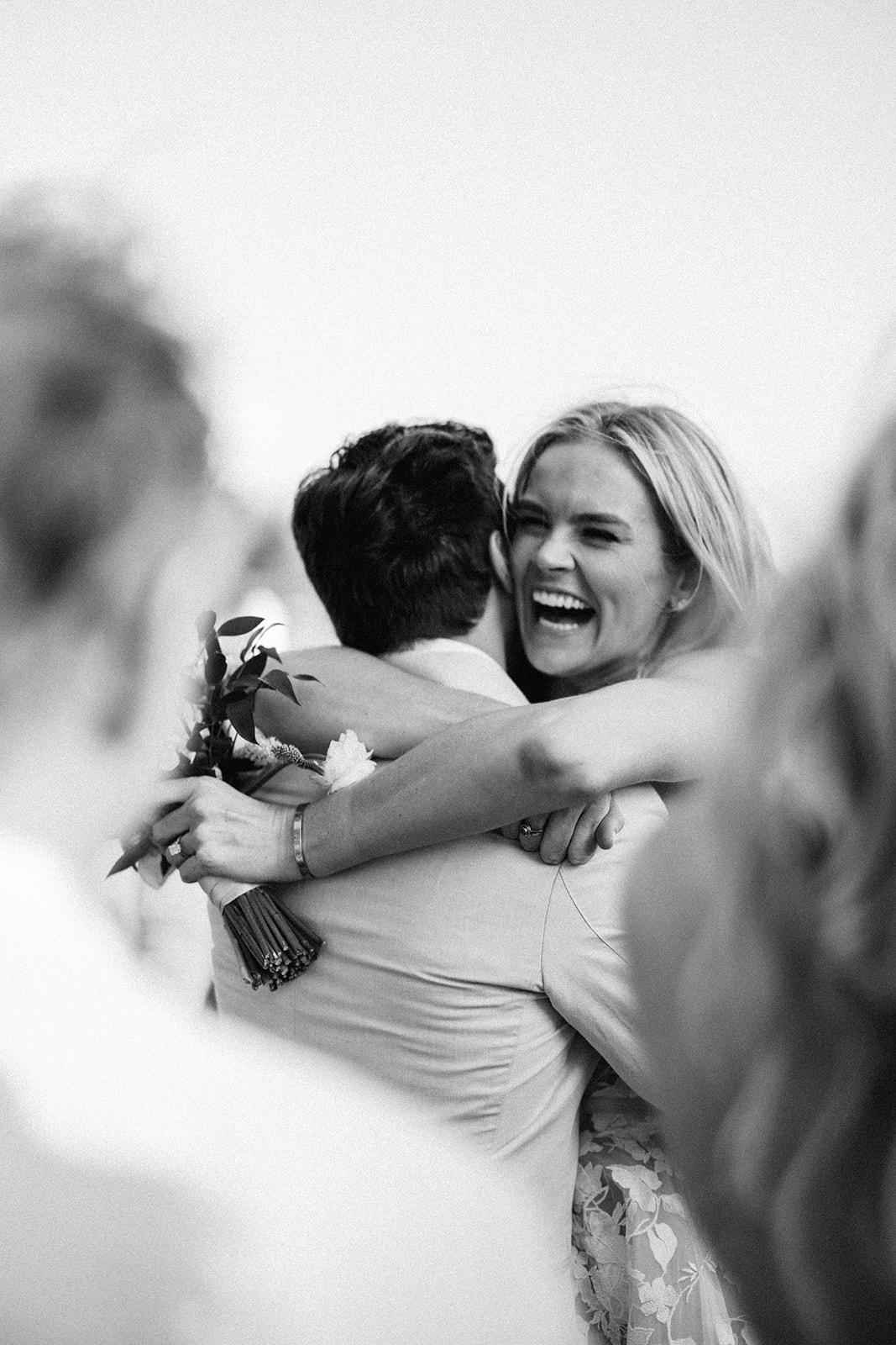 Bride hugging guest black and white, Lauren & August's Casa de Campo wedding, Dominican Republic