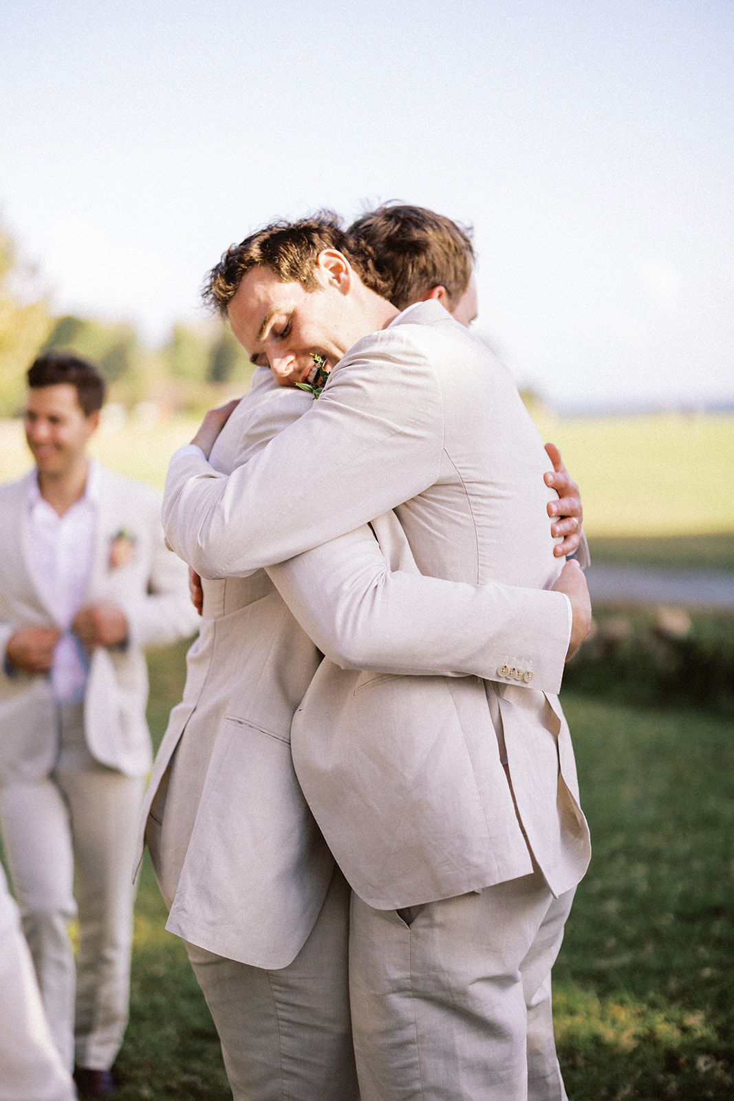 Groom hugging guest after ceremony, Lauren & August's Casa de Campo wedding, Dominican Republic