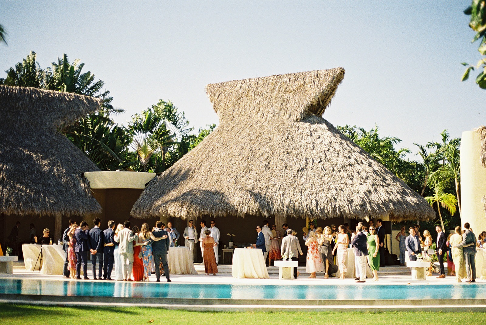Cocktail hour poolside, Lauren & August's Casa de Campo wedding, Dominican Republic