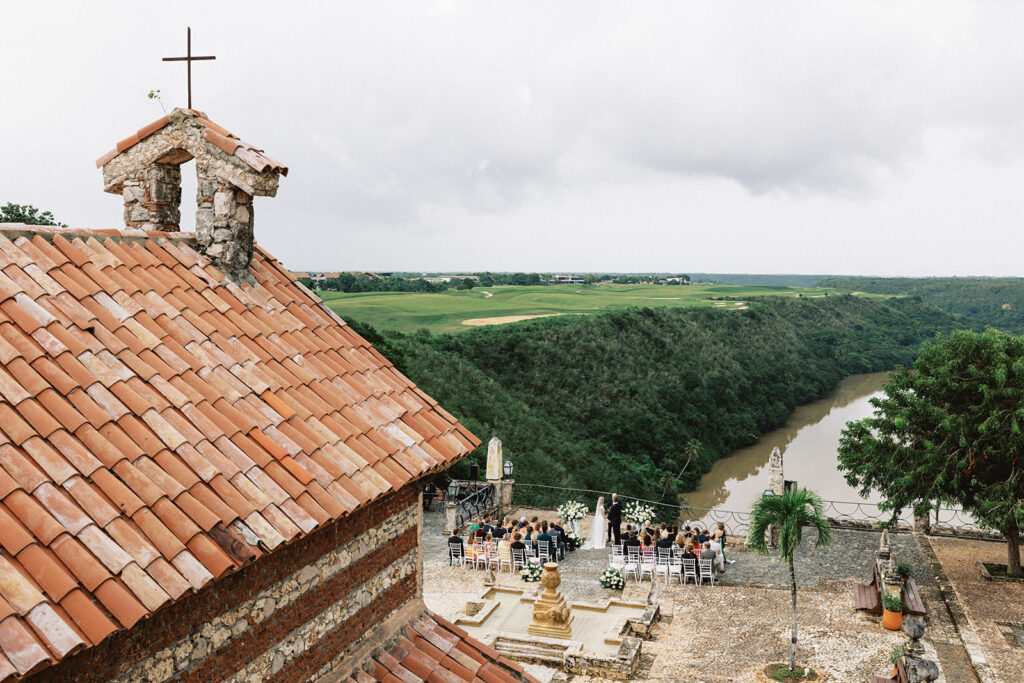 View over the church rooftop to the ceremony and the Chavón River, Altos de Chavón, Dominican Republic