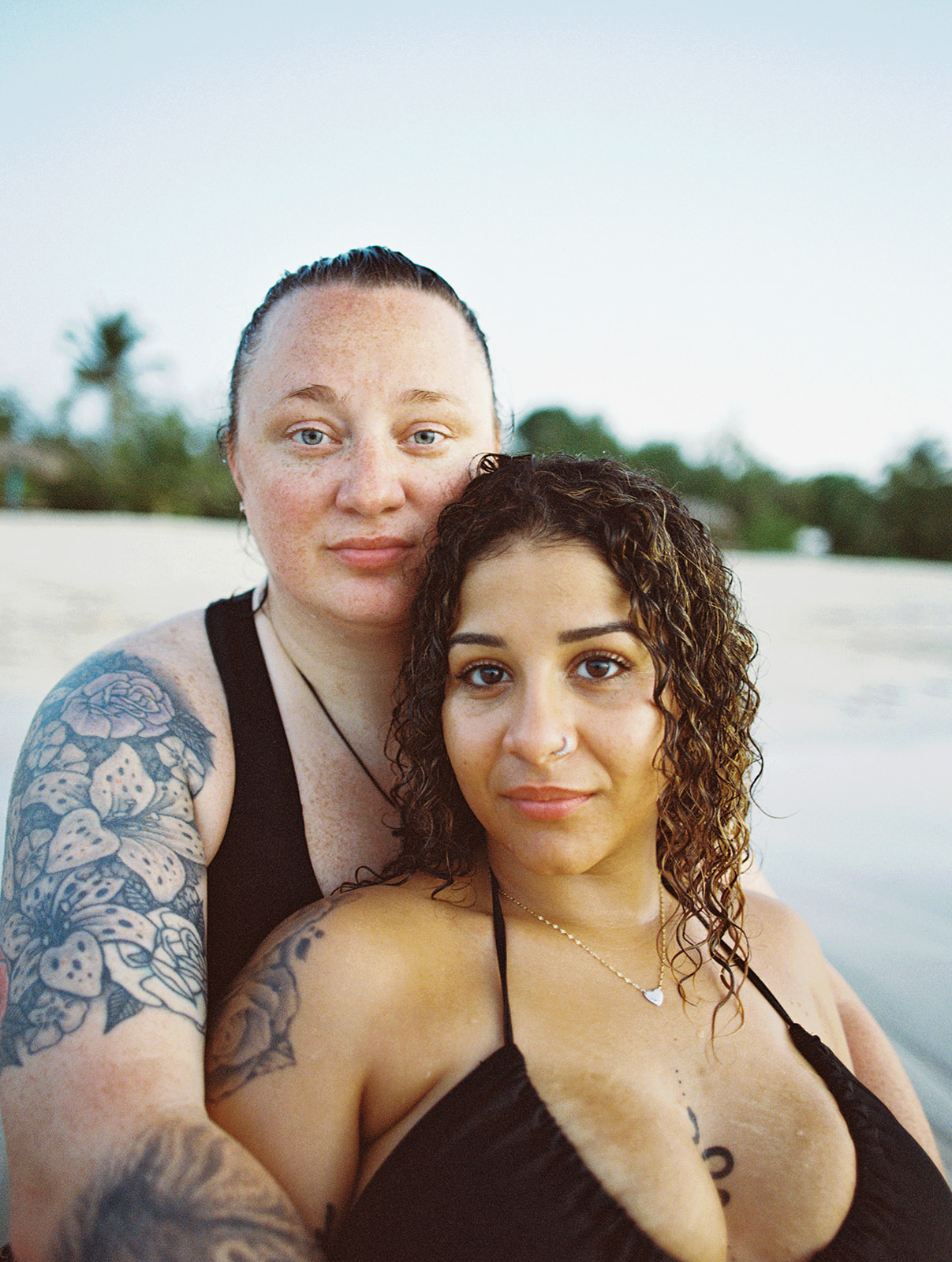 Couple leg closeup during intimate portrait session in Punta Cana, Dominican Republic