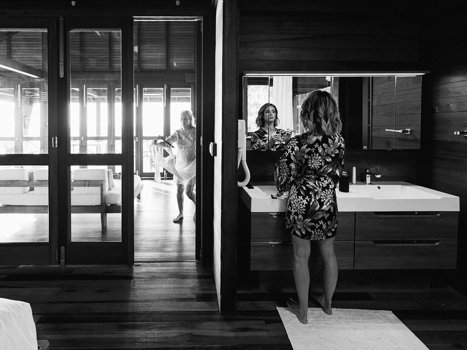 Elizabeth reflected in the mirror while getting ready