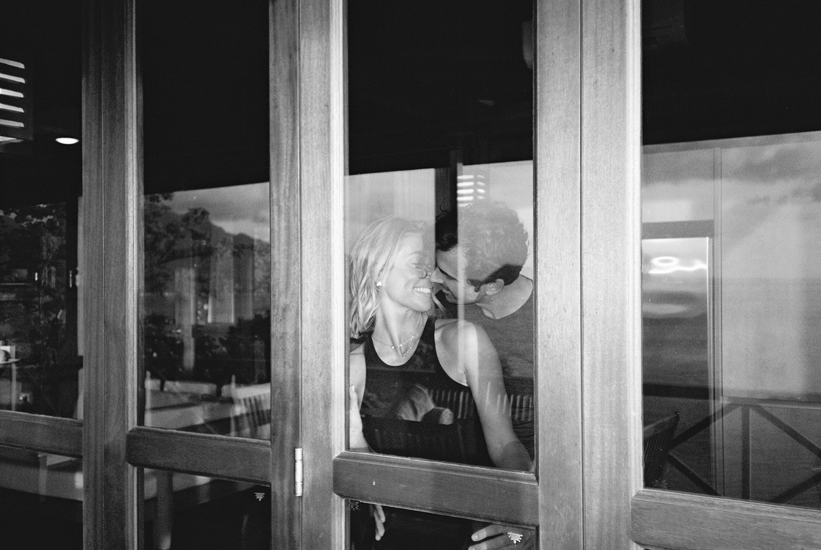 A quiet moment through the villa window at night, black and white